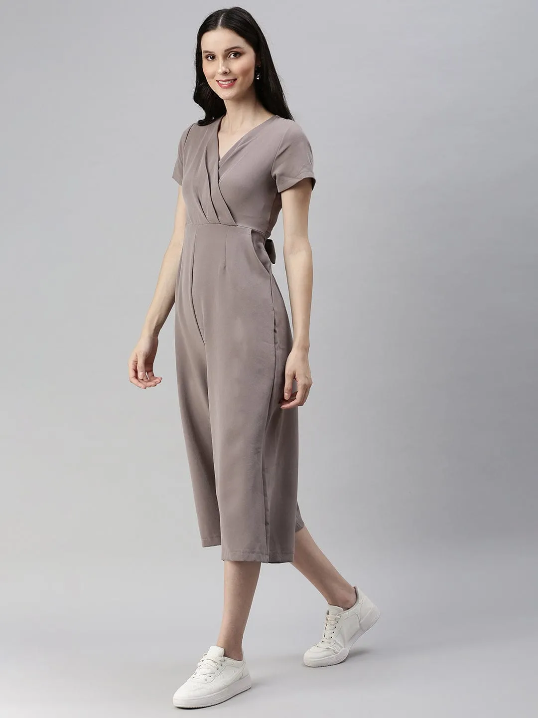 Women Beige Solid V-Neck Capri Jumpsuit