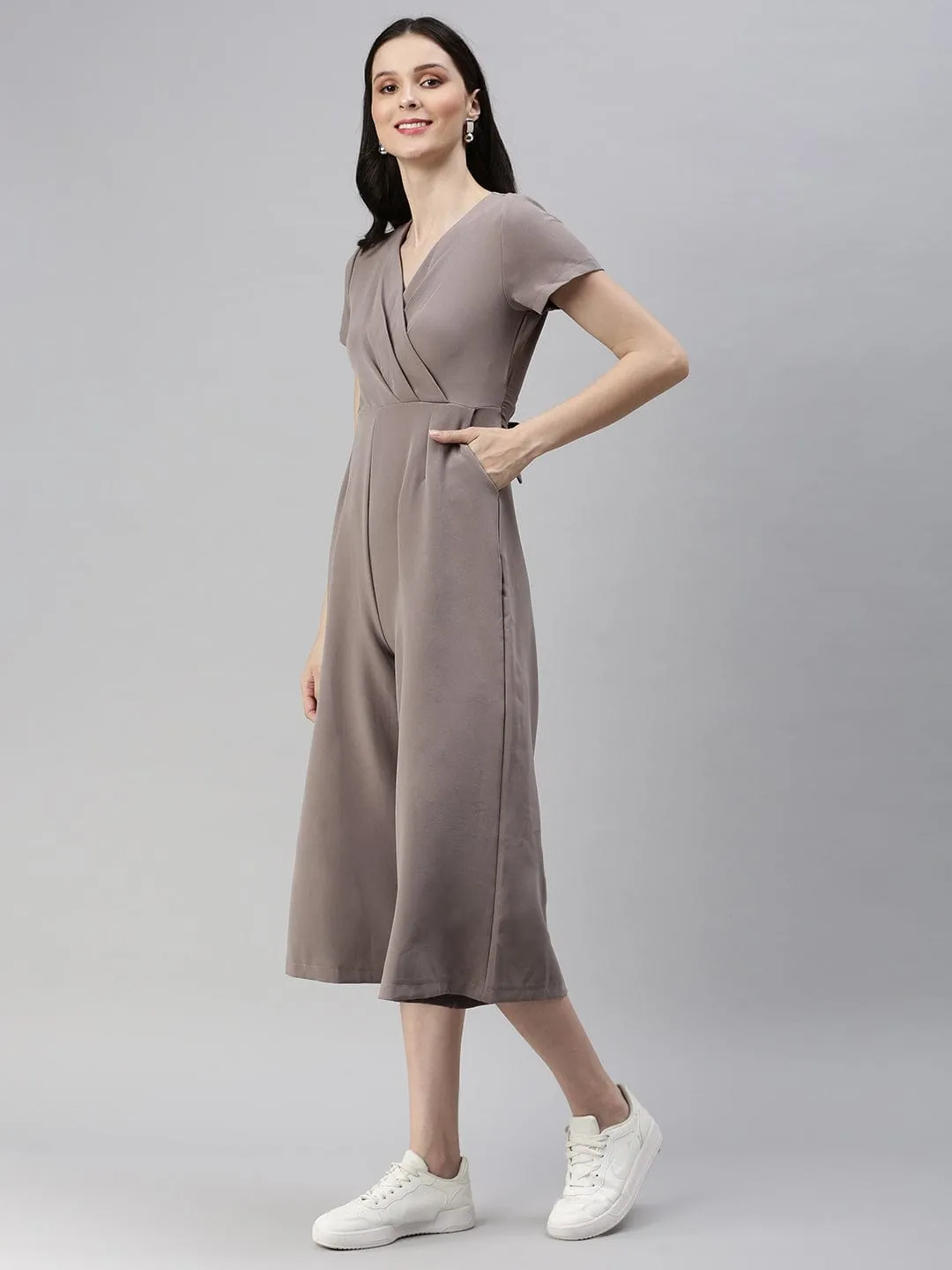 Women Beige Solid V-Neck Capri Jumpsuit