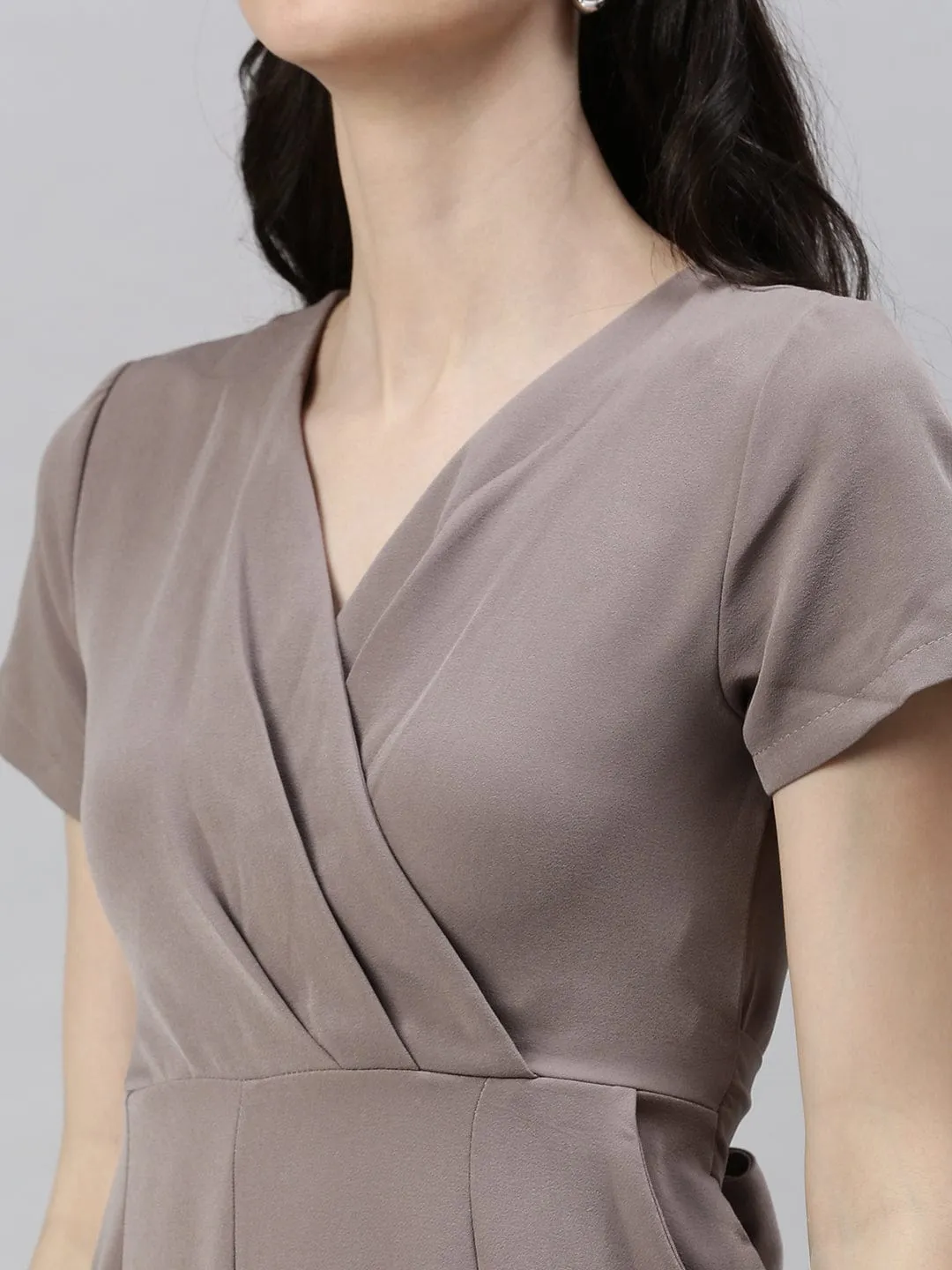 Women Beige Solid V-Neck Capri Jumpsuit